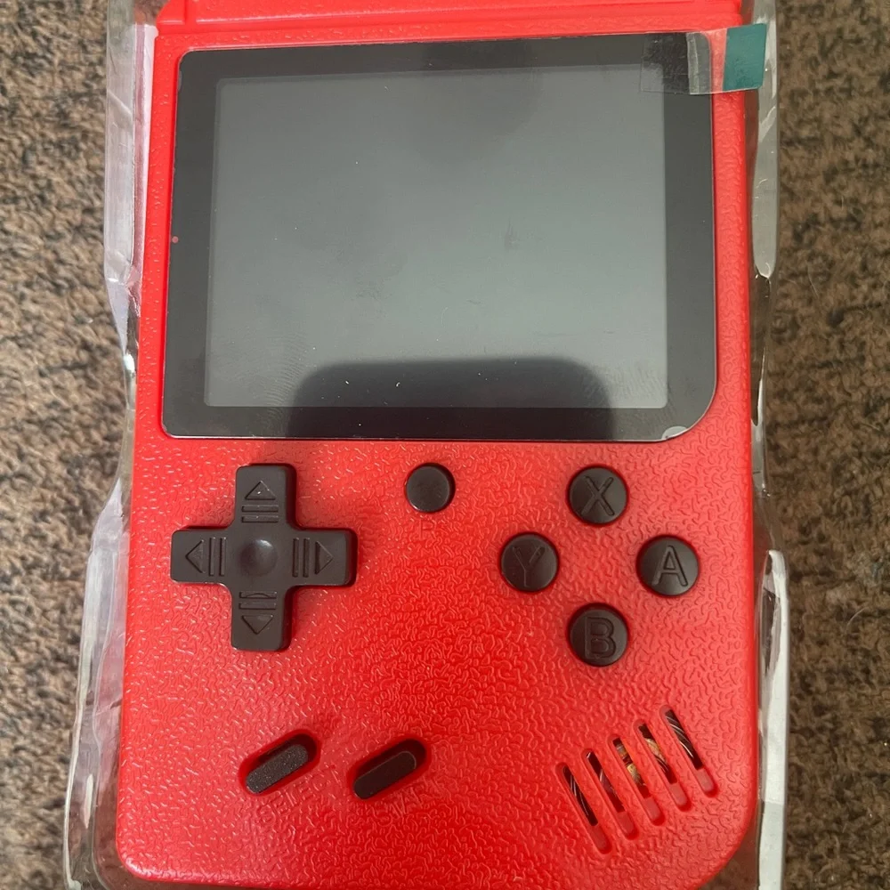 Hand held game never used. The box is destroyed though.